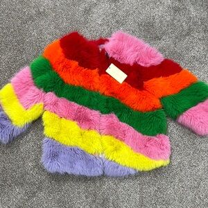 Vibrant Red and Pink Puffer Jacket with Plush Texture